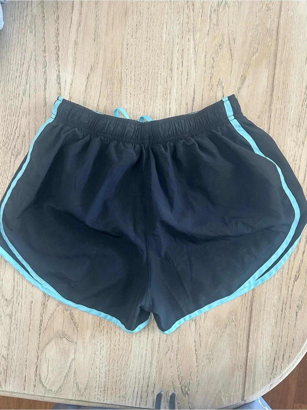 Nike Women's Black Shorts with Light Blue Trim